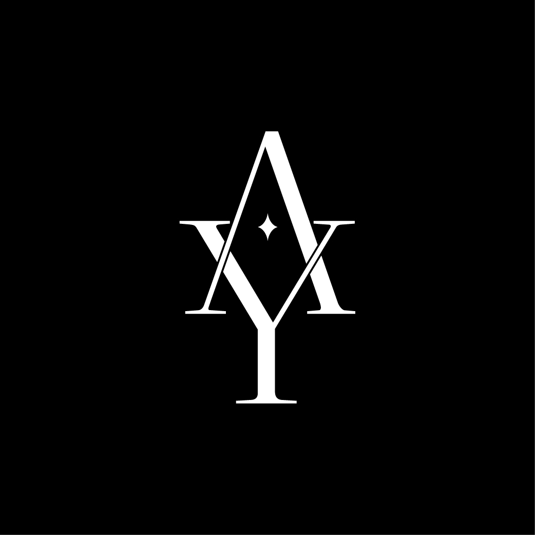 alt="Logo Atelier Yogi blanc"
